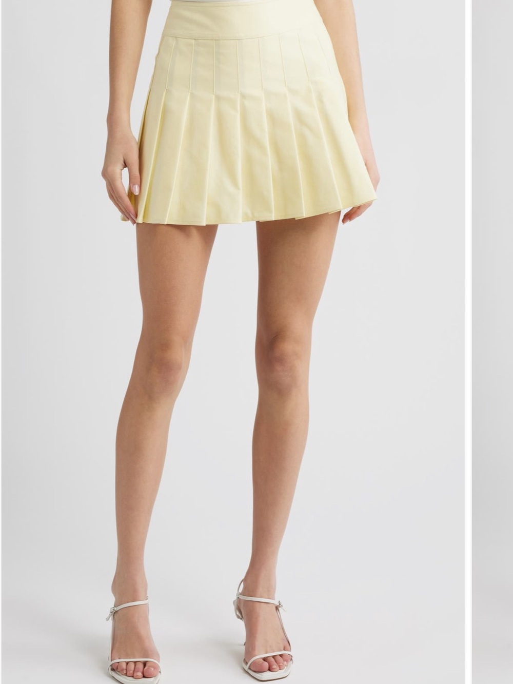 NWT ASTR Pleated Mini Skirt in Pale Yellow Sz Small so cute
